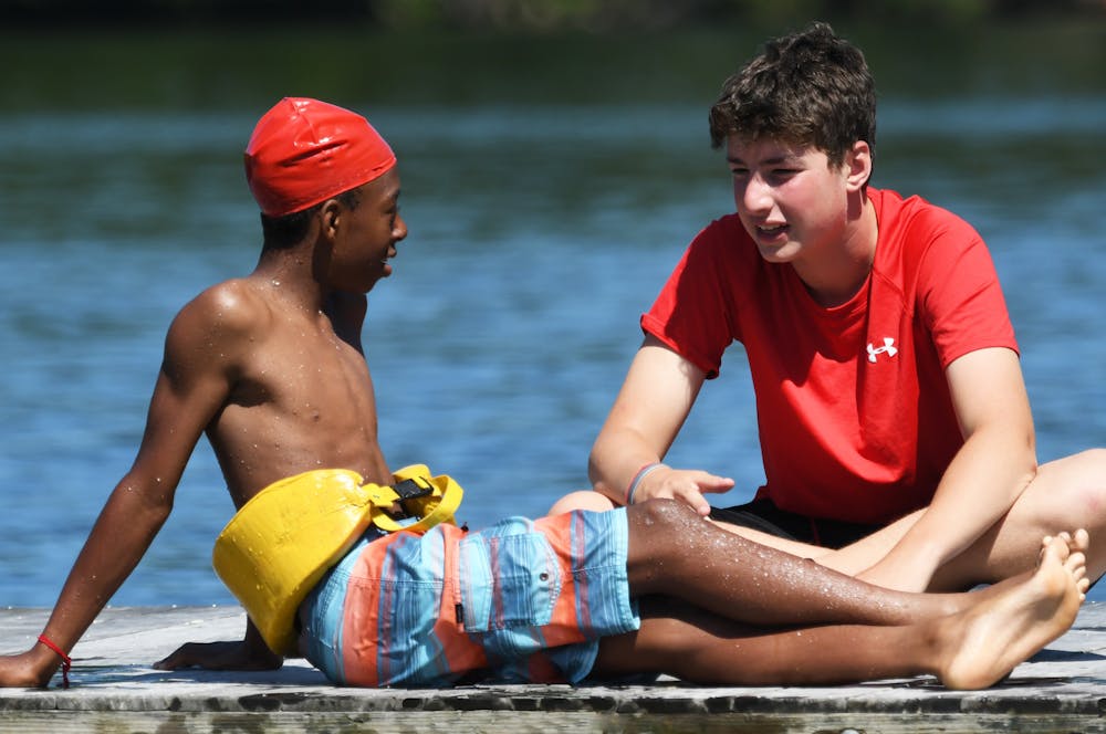 Boys on the dock at massachusetts summer camp.jpg?ixlib=rails 2.1