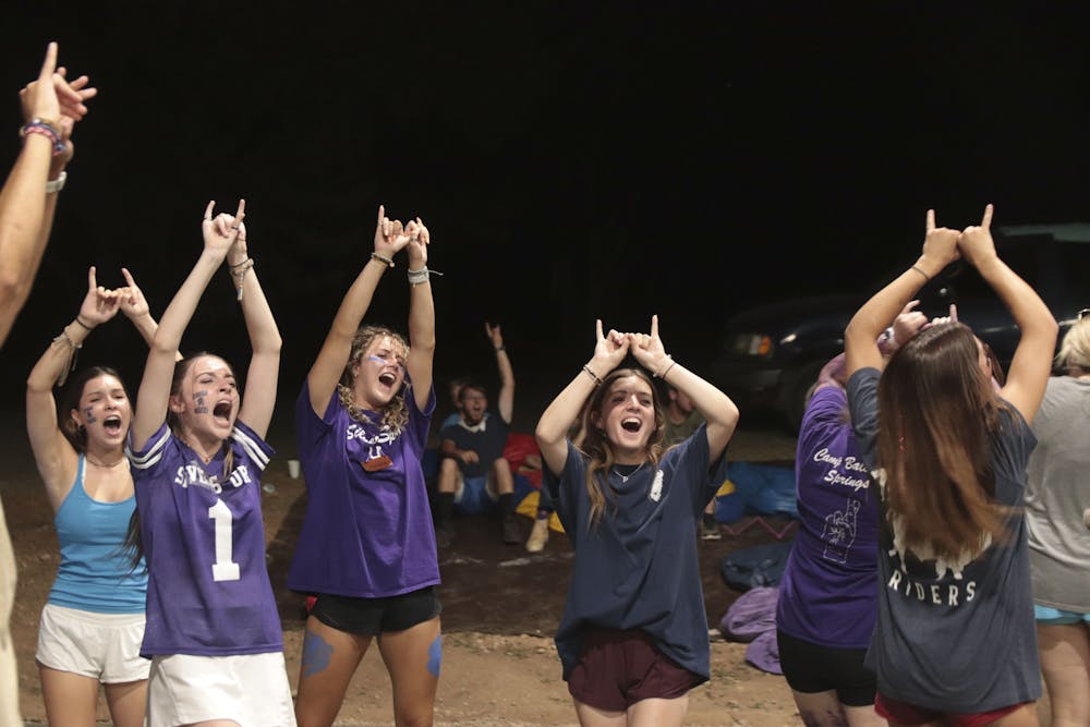 Girl campers cheering at summer camp.jpeg?ixlib=rails 2.1