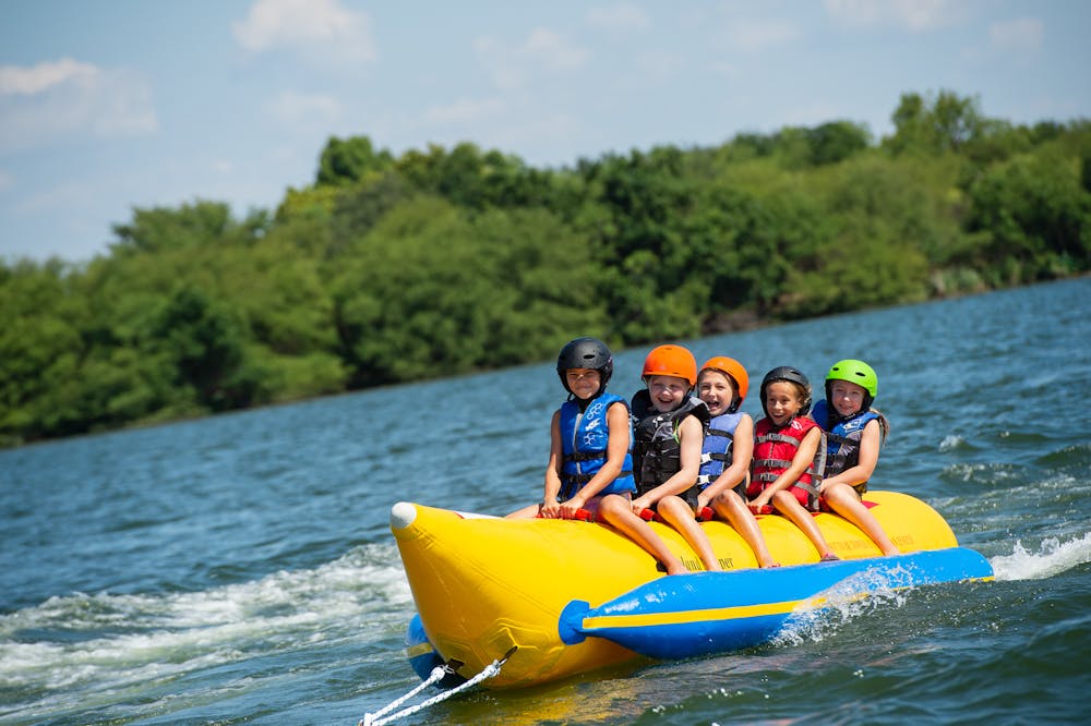 Texas summer camp kids on lake.jpeg?ixlib=rails 2.1