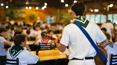 Leading singing in the dining hall.jpg?ixlib=rails 2.1
