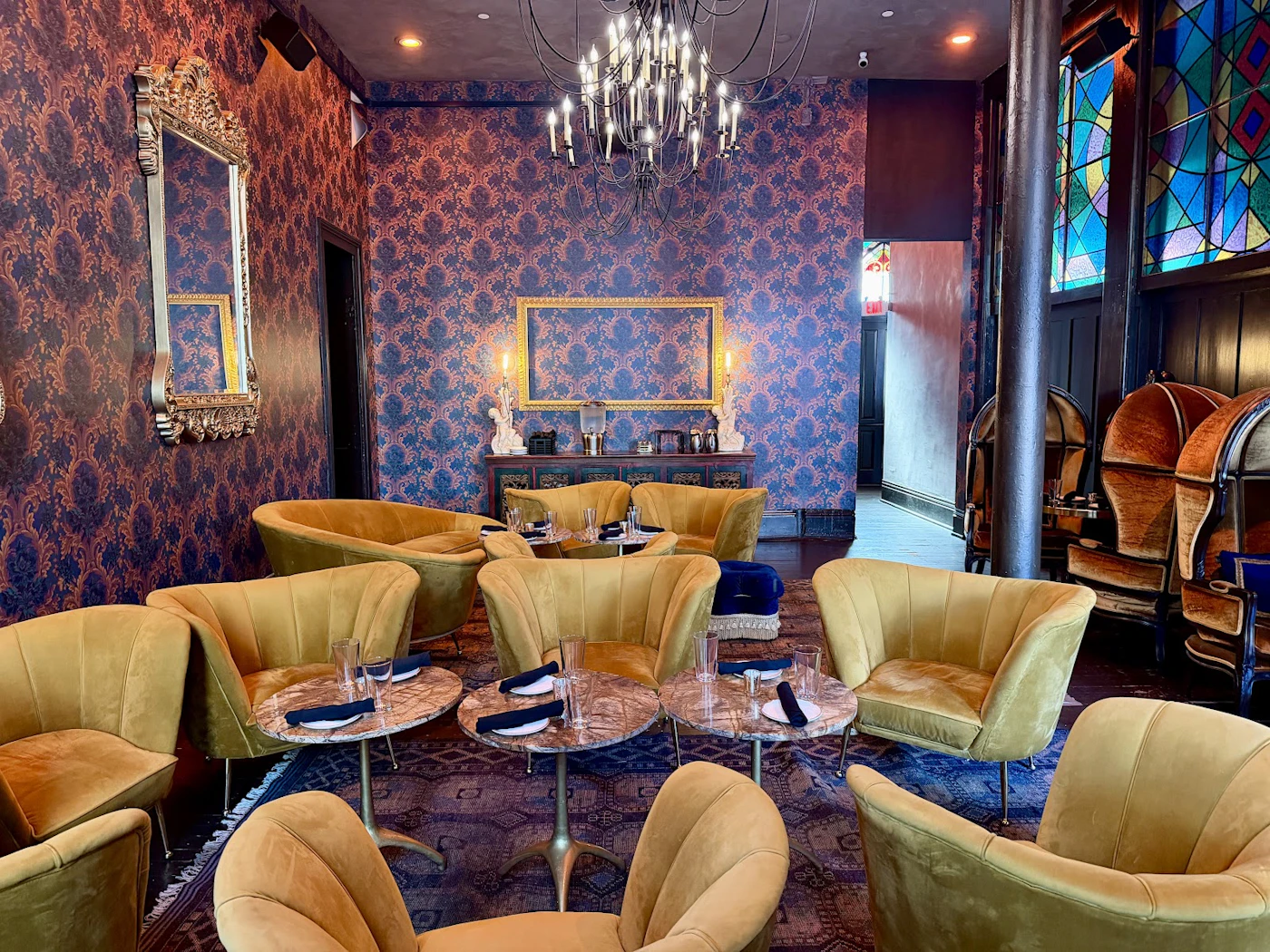 Stained glass and intimate lounge seating