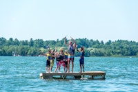 Summer camp lake in maine boys cheer counselor.jpg?ixlib=rails 2.1