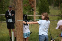 Girl aims her bow and arrow.jpg?ixlib=rails 2.1