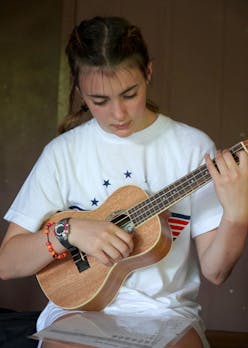 Keystone camper practicing ukulele chords.jpg?ixlib=rails 2.1