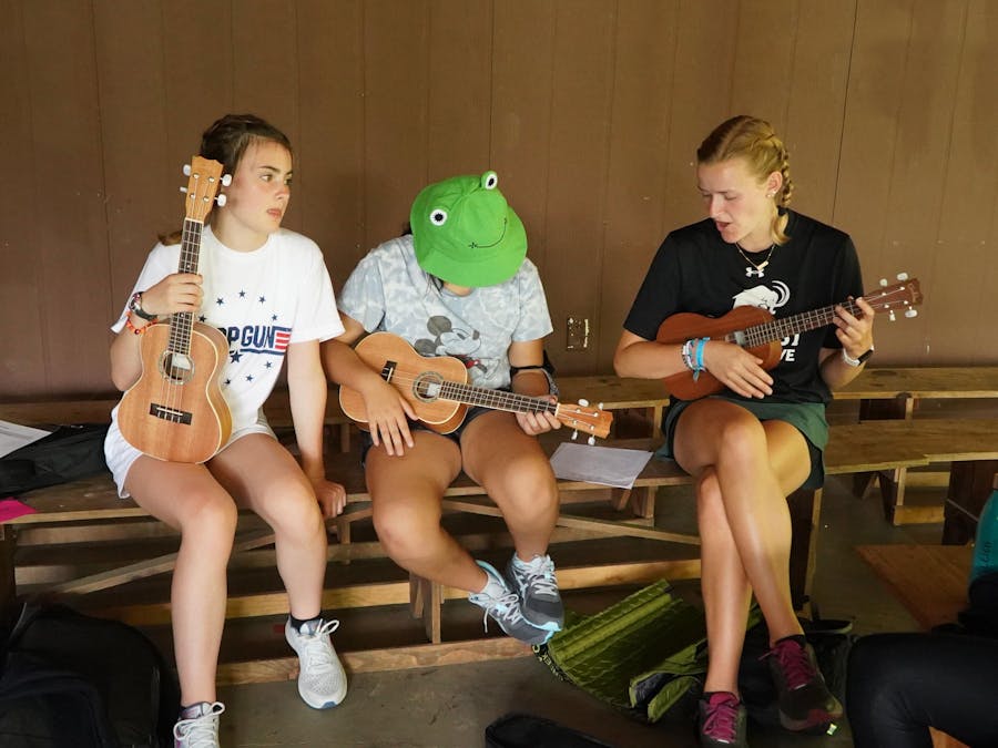 Campers learning ukulele.jpg?ixlib=rails 2.1