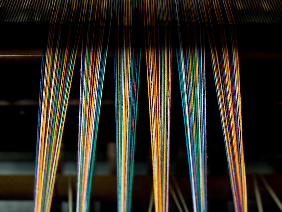 Multi colored threads on a loom.jpeg?ixlib=rails 2.1