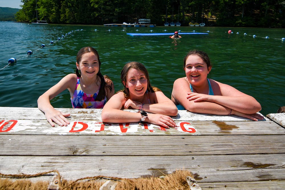 Three girls at the swim dock.jpg?ixlib=rails 2.1
