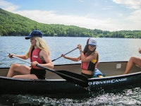 Three girls at canoe.jpg?ixlib=rails 2.1