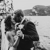 Wedding bride groom kiss lakeside wedding venue.jpg?ixlib=rails 2.1