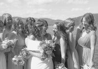 Happy bride bridesmaids.jpg?ixlib=rails 2.1