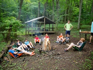 Sitting around campfire at camp highlander coed summer camp north carolina.jpg?ixlib=rails 2.1