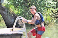 Boy climbing out of the river.jpg?ixlib=rails 2.1