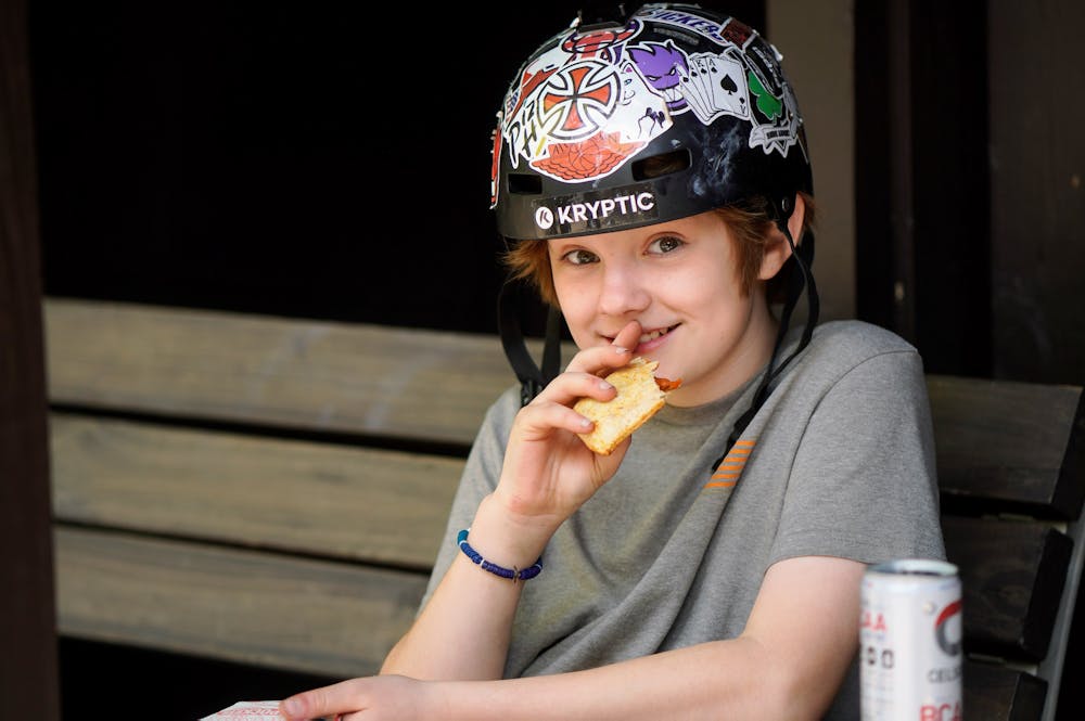Boy at camp eating healthy food.jpg?ixlib=rails 2.1
