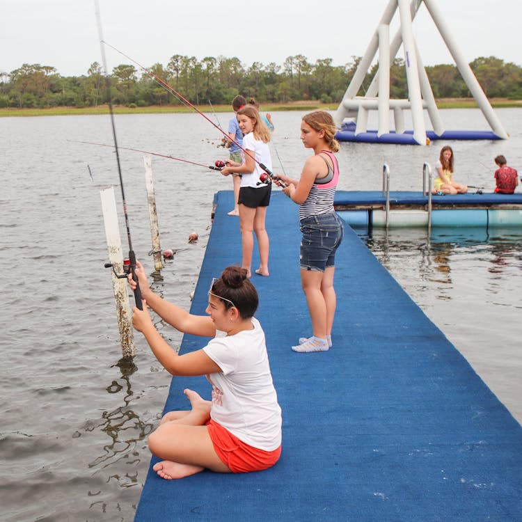 Girls fishing girl scout camp.jpg?ixlib=rails 2.1