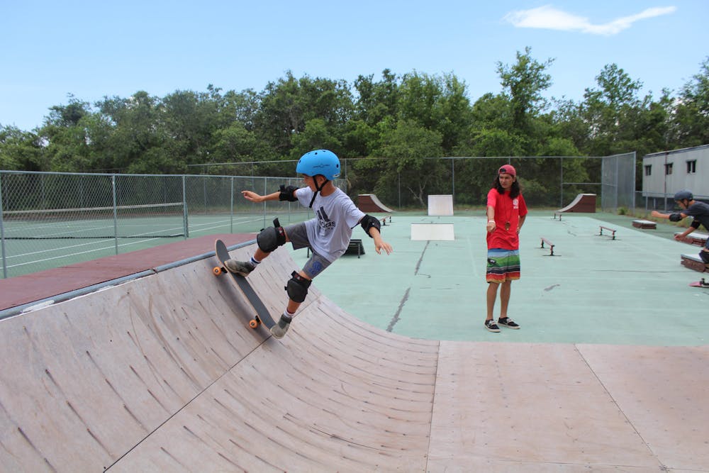 Florida skateboard camp for kids counselor boy skateboarding.jpeg?ixlib=rails 2.1