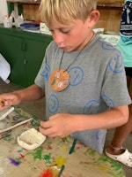 Summer camp child clay making arts and crafts florida overnight camp.jpg?ixlib=rails 2.1