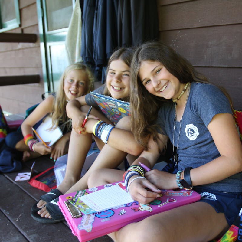 Girls camp writing letters.jpg?ixlib=rails 2.1