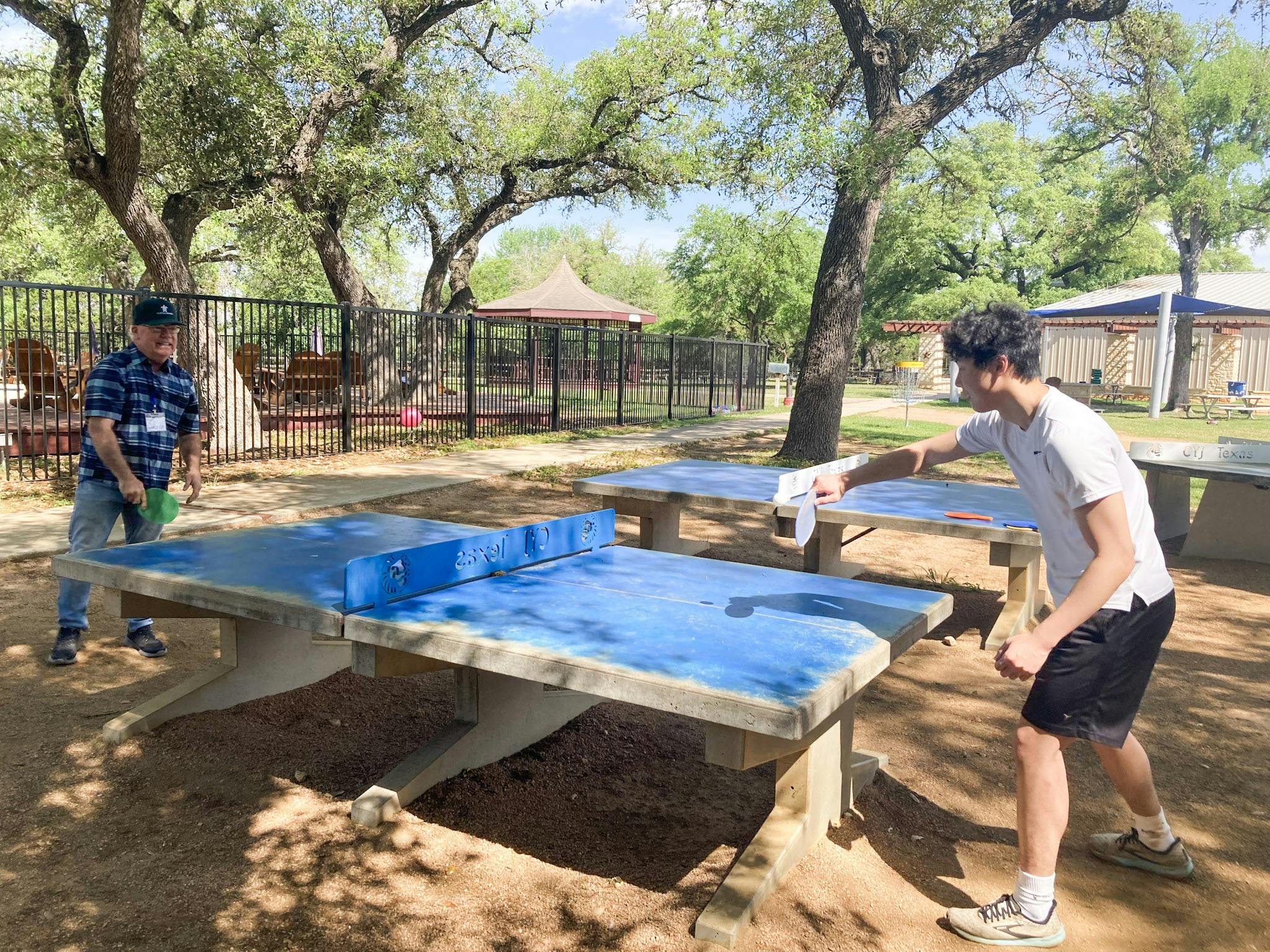 Table tennis outdoor recreation group family reunion.jpg?ixlib=rails 2.1