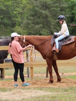 Learning ro ride horses at camp western riding .jpg?ixlib=rails 2.1