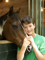 Horseback riding summer camp boy with horse.png?ixlib=rails 2.1