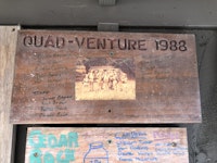 The quadventure plaque commemorating the trip  which still stands on the walls of the mountaineering hut today.jpeg?ixlib=rails 2.1