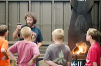 Tommy teaching blacksmithing at camp north carolina.jpg?ixlib=rails 2.1