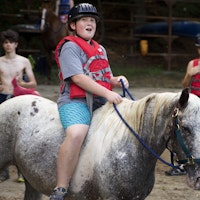 Swimming horses boys summer camp.jpeg?ixlib=rails 2.1