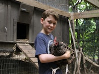 Boy holding chicken.jpg?ixlib=rails 2.1
