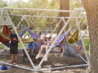 Kids camping outside hammock outdoors.jpg?ixlib=rails 2.1